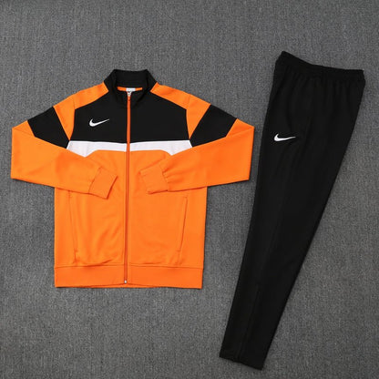 Nike Trainingsanzug Jacke Orange und Hose Schwarz Herren