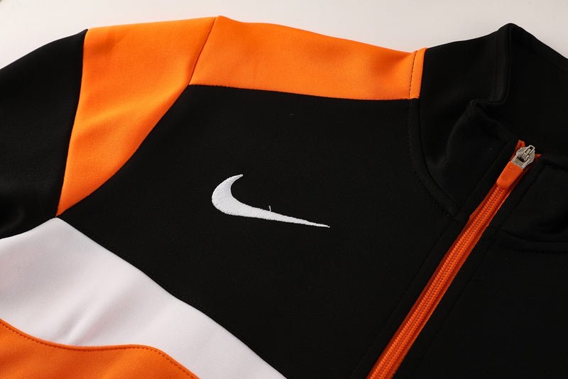 Nike Trainingsanzug Jacke Orange und Hose Schwarz Herren