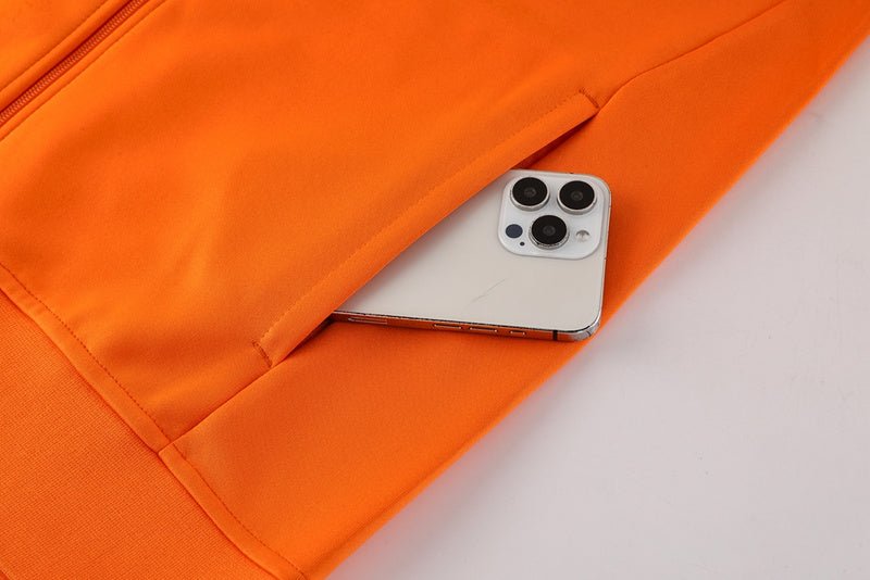 Nike Trainingsanzug Jacke Orange und Hose Schwarz Herren